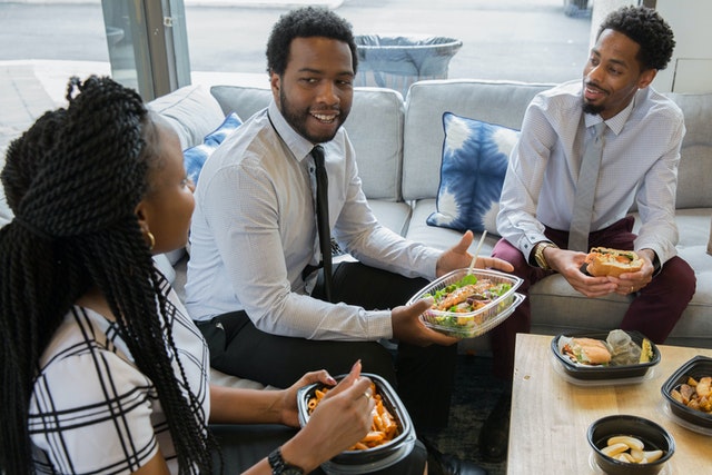 new-real-estate-agent-having-lunch-with-clients-Reazo-real-estate