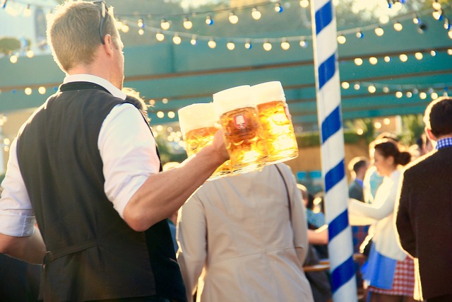 Autumn-Oktoberfest-man-carrying-beer-Reazo-real-estate