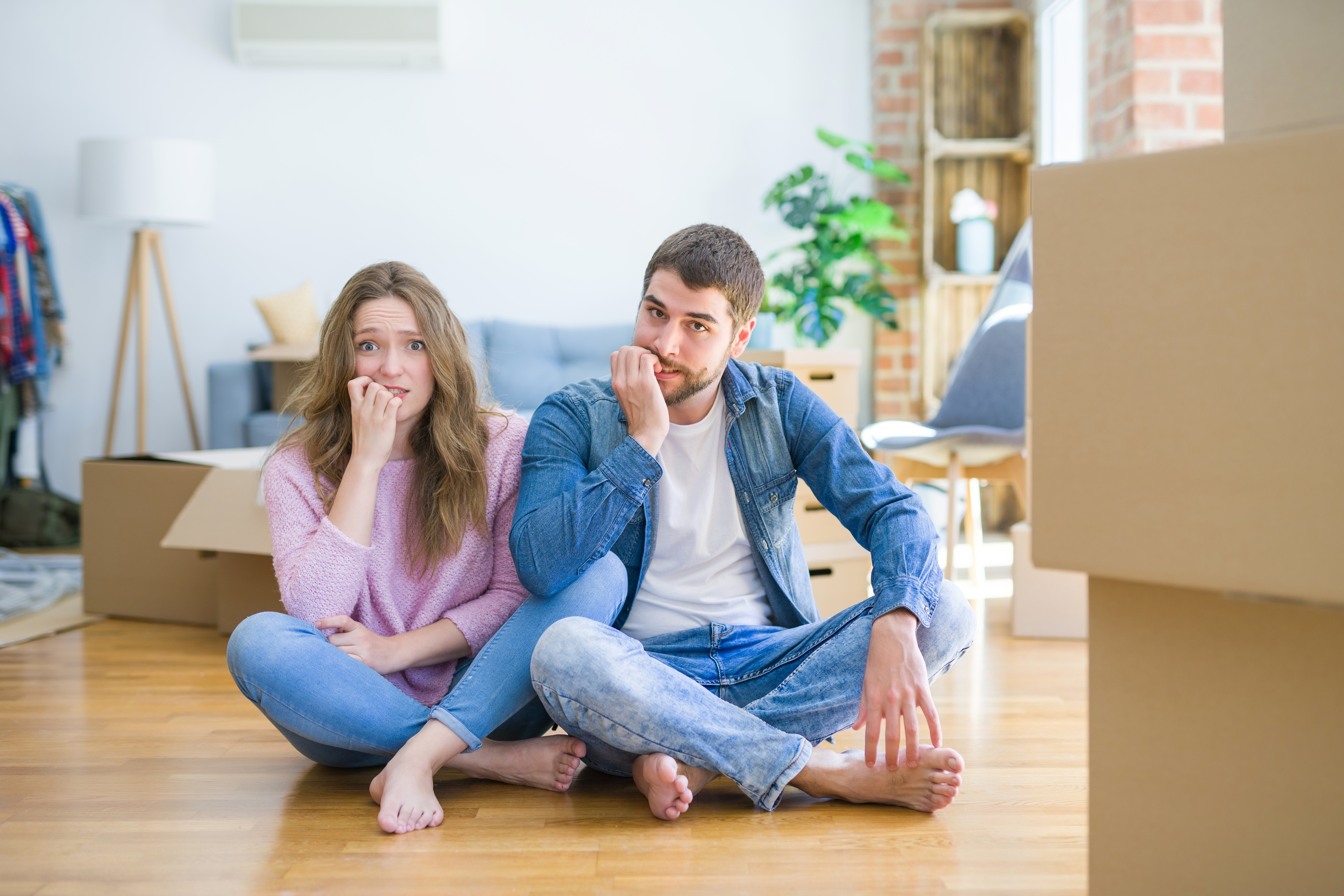 nervous-home-buyers-with-moving-boxes